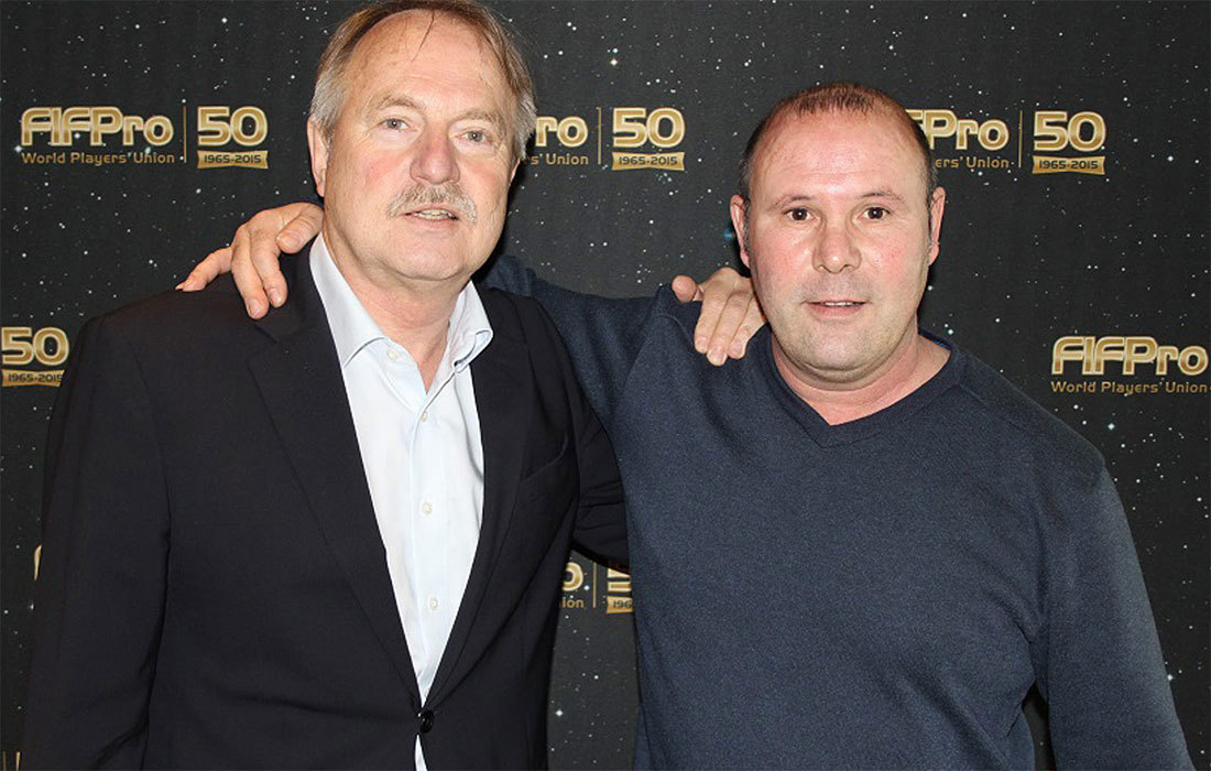Jean-Marc Bosman standing with former FIFPRO general secretary Theo van Seggelen.